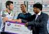 Moritz Furste of Germany receives the Best Player of the Tournament prize from Odisha Sports Minister Sudam Marndi