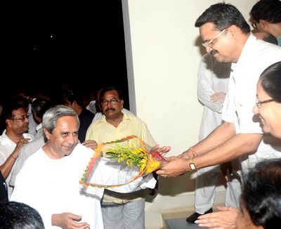 Chief Minister Shri Naveen Patnaik being given a rousing reception at Naveen Niwas after his return from London Date-31-May-2012