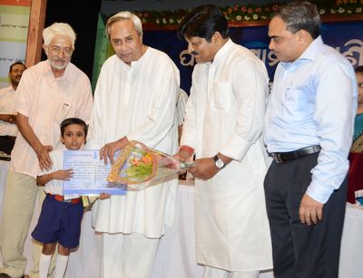 Chief Minister Shri Naveen Patnaik giving away State Level Pathani Samanta Mathematics Talent Award at Rabindra Mandap Date-18-May-2012