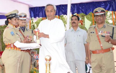 Chief Minister Shri Naveen Patnaik giving away the prizes to best trainee Police Officers at the Dikshant Parade Ceremony at Biju Patnaik Police AcademyDate-17-Mar-2012