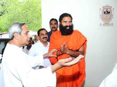 Chief Minister Shri Naveen Patnaik with Yoga Guru Ramdev at Naveen Niwas Date-13-Jun-2012
