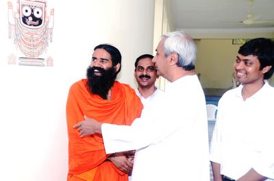 Chief Minister Shri Naveen Patnaik with Yoga Guru Ramdev at Naveen Niwas Dated-13-Jun-2012