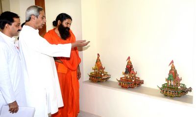 Chief Minister Shri Naveen Patnaik with Yoga Guru Ramdev at the Naveen Niwas Date-13-Jun-2012 