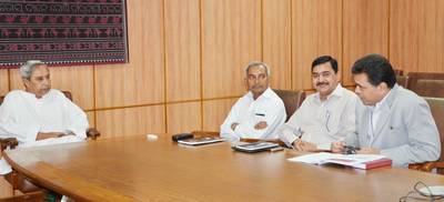 Chief Minister Shri Naveen Patnaik reviewing on Rashtriya Swasthya Bima Yojana (RSBY) in Odisha