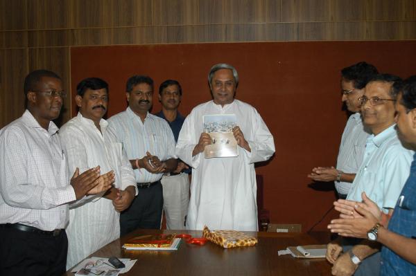 Chief Minister Shri Naveen Patnaik releasing the State of the World Population Report-2007 at Secretariat.