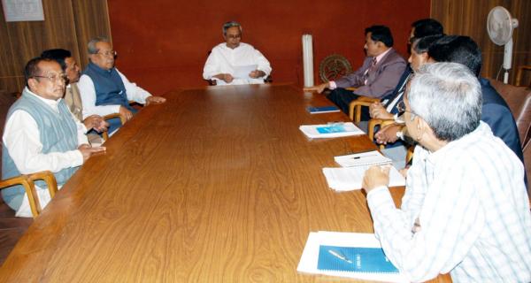 Naveen Patnaik presiding over a meeting on development of Scheduled areas by Psus and Corporate Houses at Secretariat.